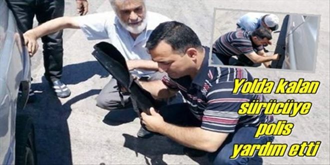 Yolda kalan sürücüye trafik  polisinden yardım eli?