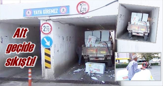 Alt geçide sıkıştı!