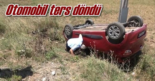 Otomobil ters döndü