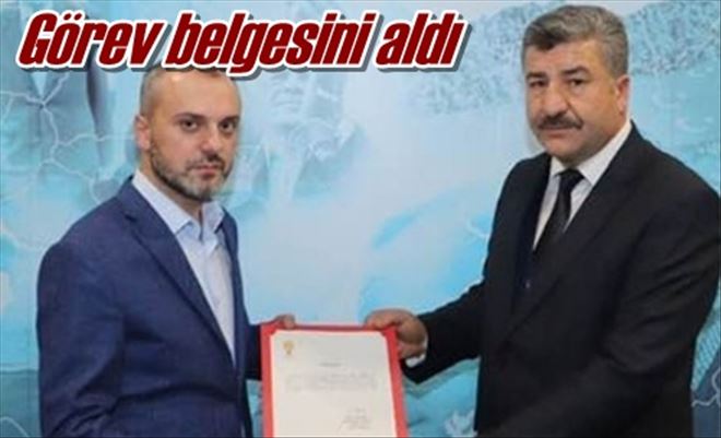 Görev belgesini aldı