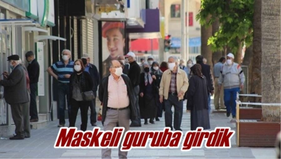 Maskeli guruba girdik