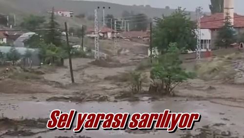 Sel yarası sarılıyor