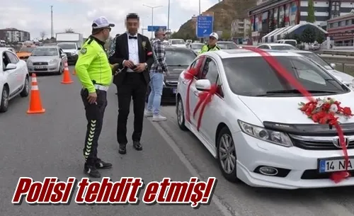 Polisi tehdit etmiş!