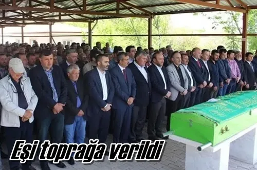 Eşi toprağa verildi