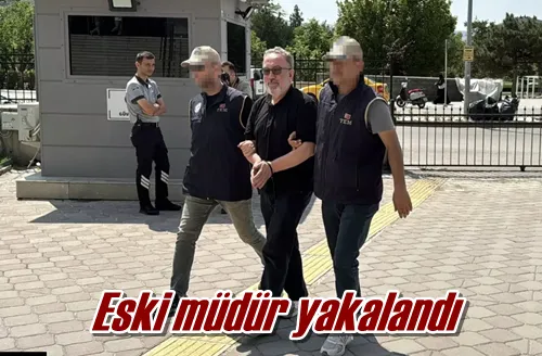 Eski müdür yakalandı