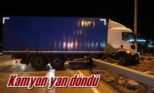 Kamyon yan döndü