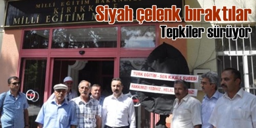 Siyah çelenk bıraktılar