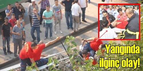 Yangında itfaiyeciyi kurtarma çabası!